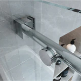 Close-up of the CSS04 round guide rail, roller, and glass attachment